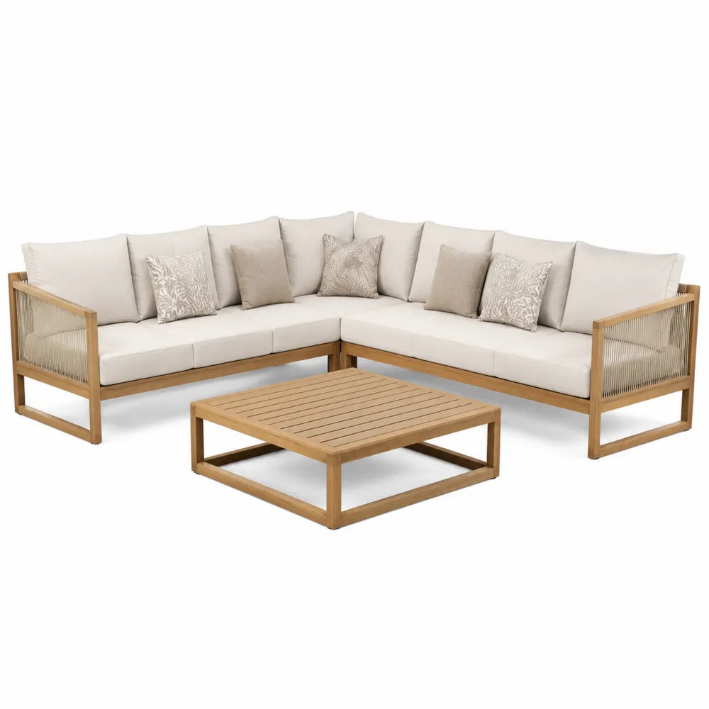 Narożna sofa z drewna teak z beżowymi poduszkami